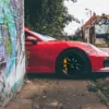 Photo Porsche GT4 rouge Photographie Porsche GT4 dans rues abandonnees de Doel Belgique, tirage art edition limitee