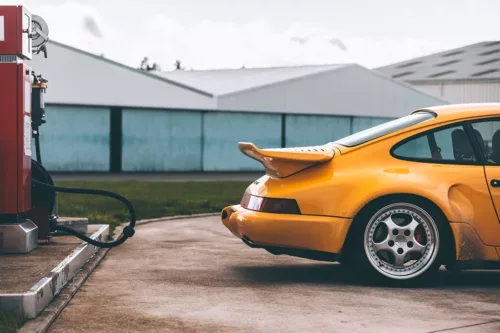 Yellow Porsche at the Station Photo Porsche 930 Turbo S