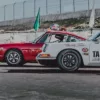 Photographie Porsche 911 Laguna Seca Photographie artistique d'une Porsche 911 en action sur le célèbre circuit de Laguna Seca en Californie, capturant la puissance et l'agilité de la voiture de sport allemande