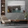 Photo déco murale de l'arche naturelle de Dyrhólaey en Islande montrant la falaise noire et l'océan sous un ciel dramatique, parfaite pour décoration intérieure nordique