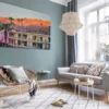 Boho interior design of living room with sofa and rattan armchai Photographie encadrée du Sunset Saguaro Palm Springs affichée dans un intérieur moderne scandinave au-dessus d'un canapé blanc