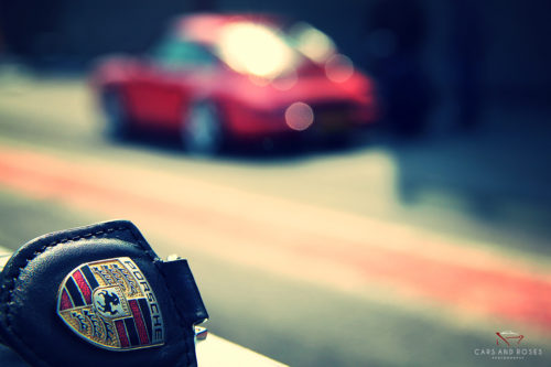 Porsche Key and 911 Carrera in Background